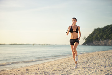 woman running seaside beach
