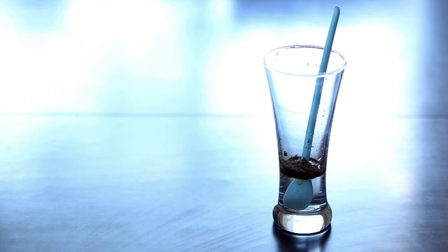 Nesscaffee or instant coffee making - closeup