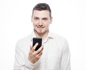  happy business man reading an SMS on smartphone 