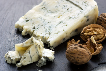Gorgonzola cheese on black background