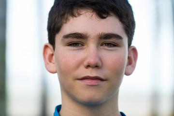 Obraz premium Portrait of a handsome young male teenager