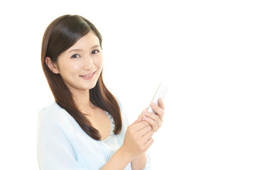 スマートフォンを持つ女性