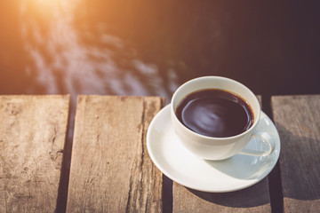 White coffee cup in the park