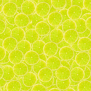 Abstract background with slices of fresh limes. Seamless pattern