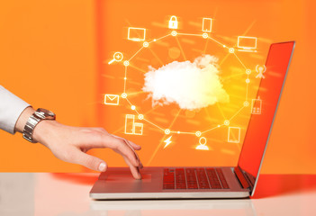 Hand working with a Cloud Computing diagram