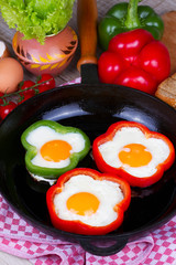 Fried eggs in peppers