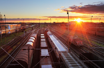 Naklejka na ściany i meble Freight Station with trains - Cargo transportation