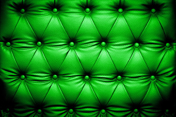 Dark green leather texture with buttoned pattern