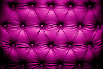 Dark purple leather texture with buttoned pattern