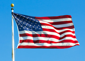 Fototapeta premium American flag against blue sky