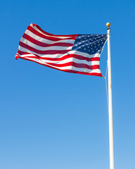 Fototapeta premium American flag against blue sky