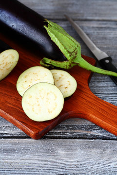 Raw eggplant  and cutting boards