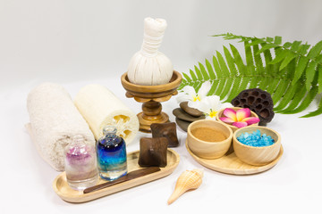 Spa massage setting with towels compress balls and herb