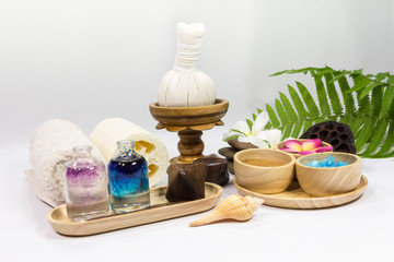 Fototapeta na wymiar Spa massage setting with towels compress balls and herb