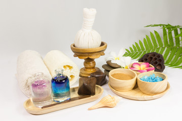 Spa massage setting with towels compress balls and herb