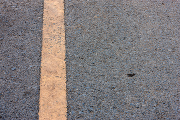 Fototapeta premium Asphalt road with yellow lines