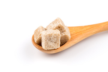 brown sugar in a wooden spoon