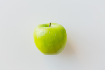 ripe green apple over white