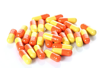 Opened pill with medicine powder