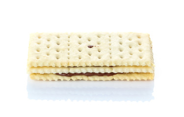 Sandwich biscuits with chocolate on white background