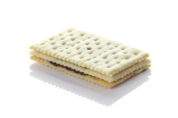 Sandwich biscuits with chocolate on white background