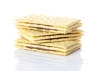 Sandwich biscuits with chocolate on white background