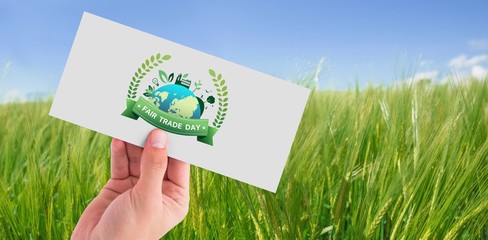 Composite image of hand showing card