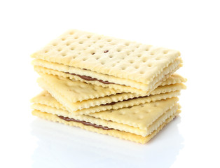 Sandwich biscuits with chocolate on white background