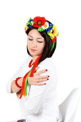 beautiful young brunette woman wearing national ukrainian clothe
