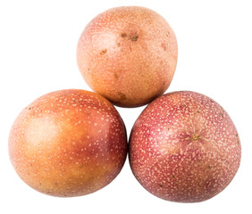 Passion fruit over white background