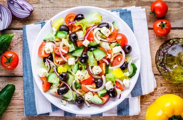 Greek salad of organic tomatoes, cucumber, olives, feta cheese