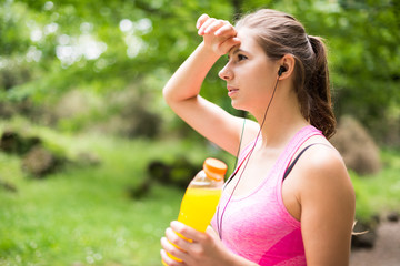 Woman drinking after sport