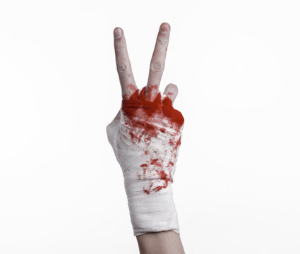bloody hand in a bandage, bloody bandage, white background