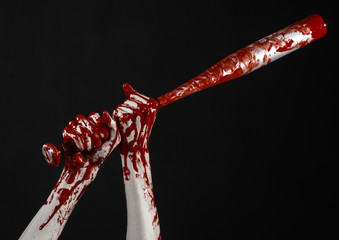 bloody hand holding a baseball bat, a bloody baseball bat