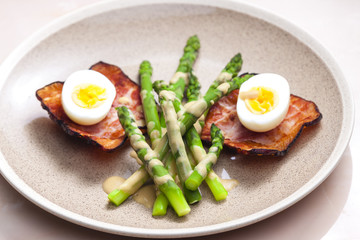 boiled green asparagus with bacon, egg and mustard dip