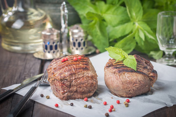 Grilled beef steak close up on paper