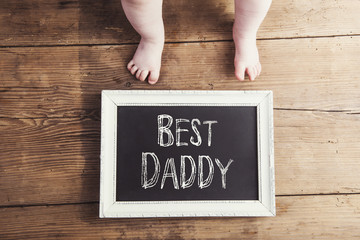 Fathers day composition. Studio shot on wooden background.