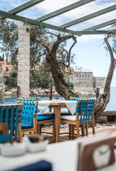  summer terrace of restaurant. Sea view on islet Saint Stephen