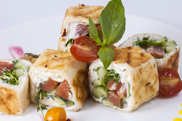 rolls with vegetables and red fish