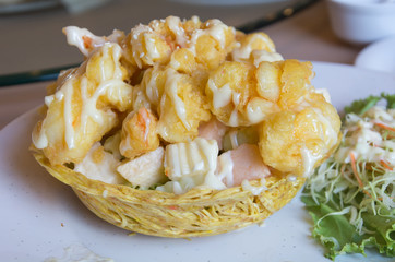 Shrimp fried with cream salad on taro cup fried