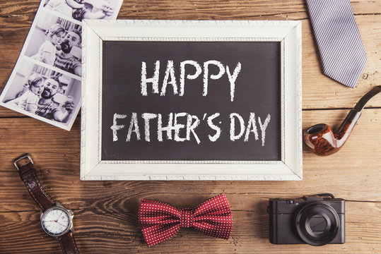 Fathers day composition on wooden desk background.