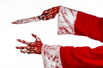 Santa's bloody hands of a madman holding a bloody knife