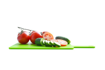 vegetables on cut board white background