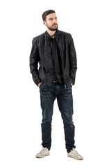 Male model in leather jacket with hands in pockets