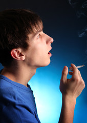 Fototapeta premium Young Man with Cigarette