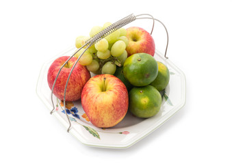 Isolated platter of assorted fruit