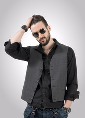 Obraz premium Handsome confident male model with sunglasses