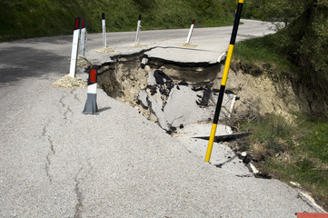 Road partially blocked by slide