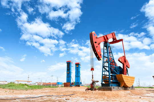 Oil Well And Blue Sky