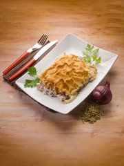 focaccia with carasau bread ricotta onions and fennel seed